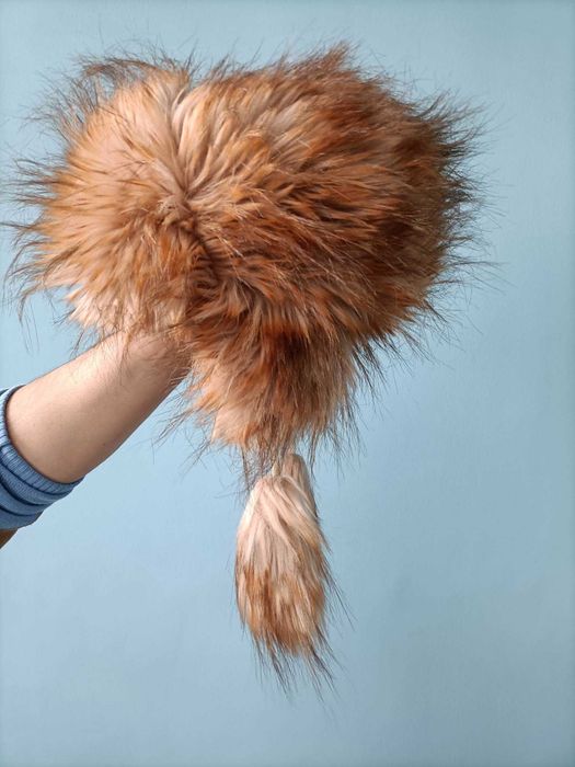 Modna czapka uszatka obszyta futrem