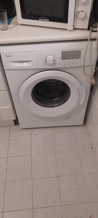 Maqiina de lavar roupa