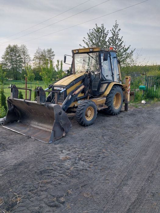 CAT 428C  koparko-ładowarka
