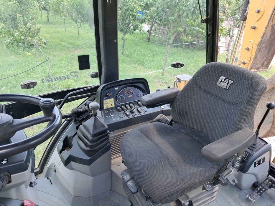 Koparko ładowarka cat 428 e