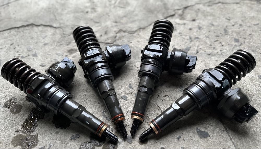 Форсунка насос 1.9 tdi Volkswagen T5 038130073AG 0414720215