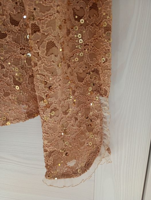 Cekinowa złota bluzka bolerko