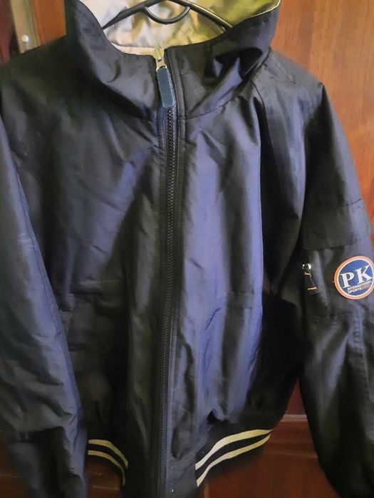 Двохстороння  утеплена  куртка 38  розмір