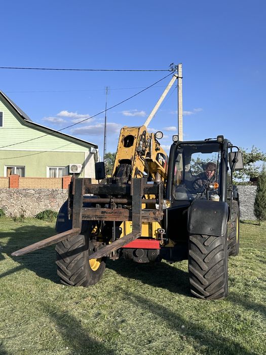 Телескопічний навантажувач JCB Manitou CAT TH 406 manitou