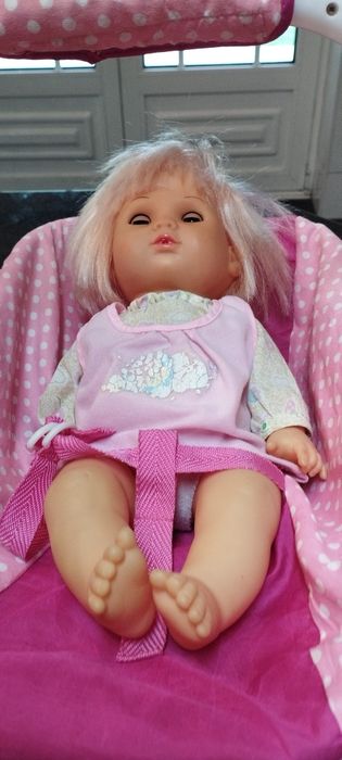Boneca com alcofa