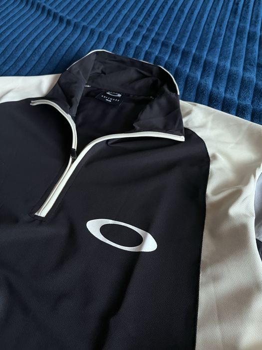 Oakley sweater.