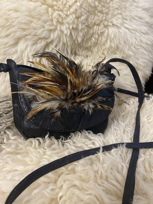 Шкіряна сумочка ручної роботи