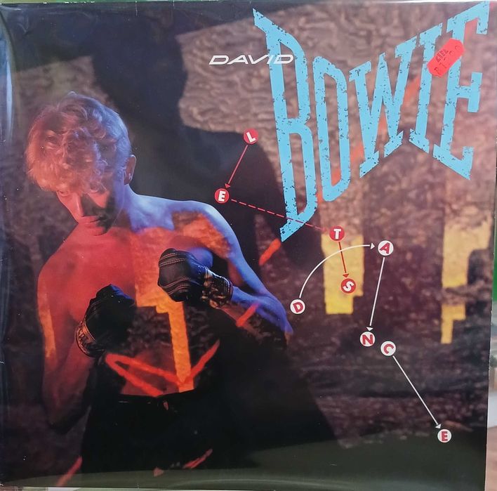 Коллекция виниловых пластинок Eminem Louis Armstrong David Bowie