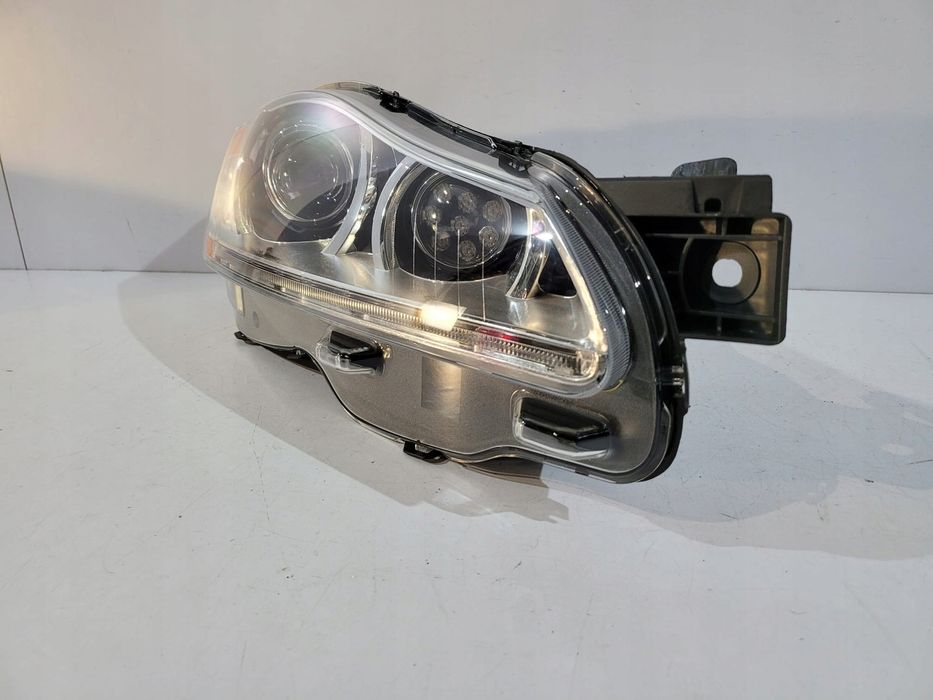 Jaguar XJ lampa przednia bi-xenon R 13440