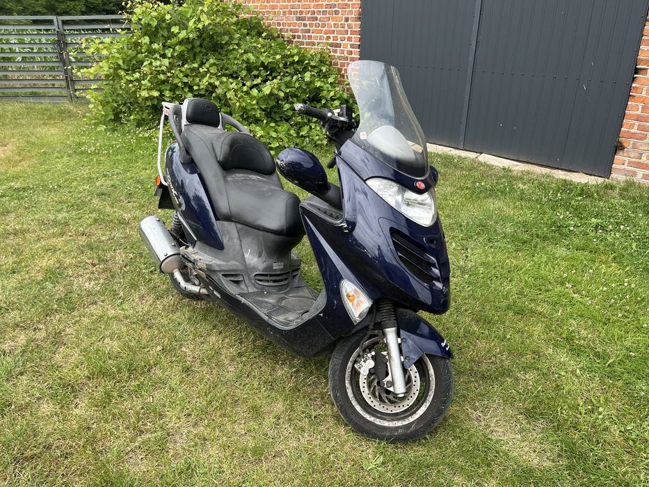 Kymco Grand Dink 125 na części czasza osłony gaźnik lusterka płozy