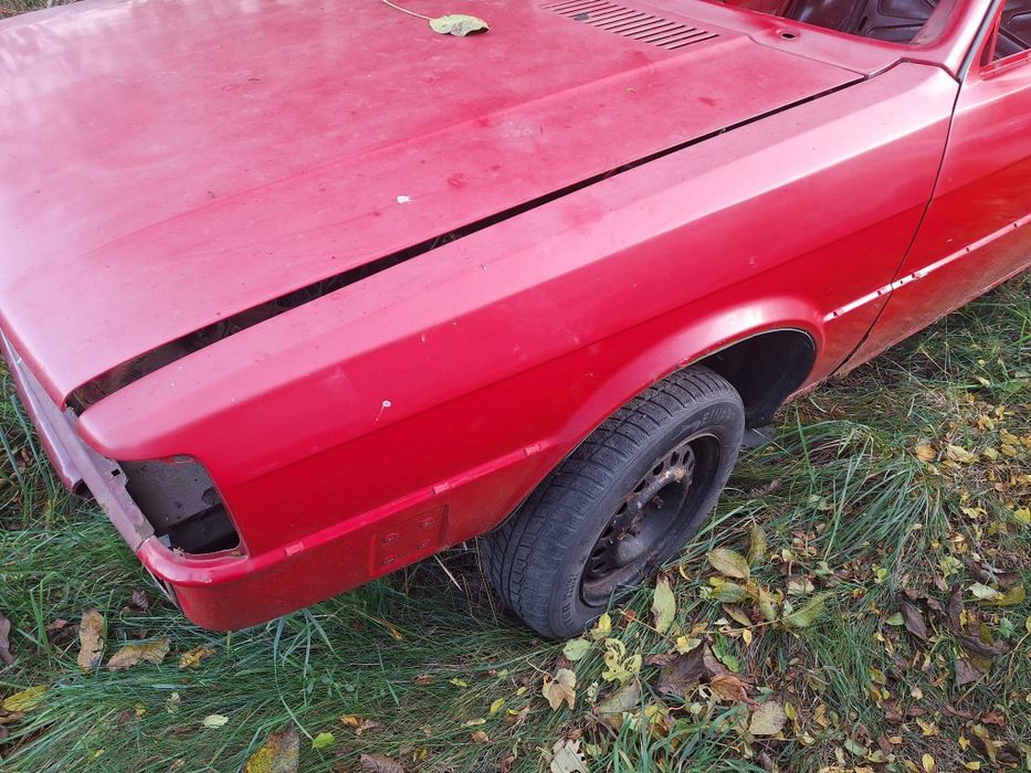 Blotnik lewy audi 80 B2