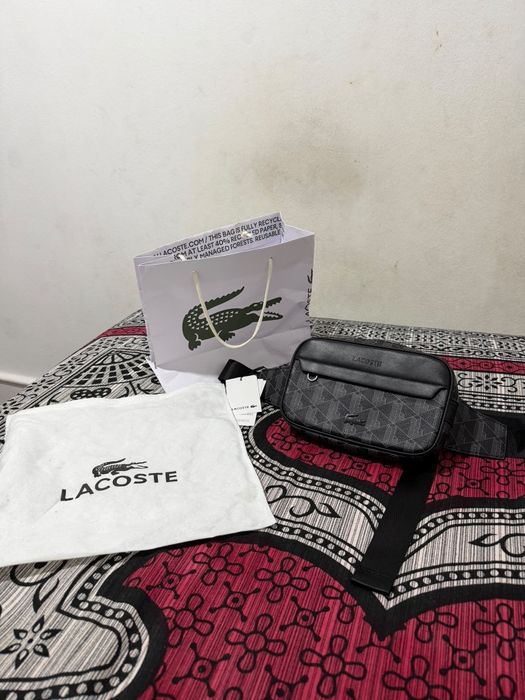 Bolaa da lacoste da cintura