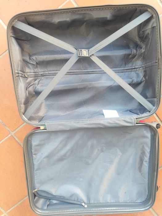Blusão moto  em couro + 1 mala de viagem.