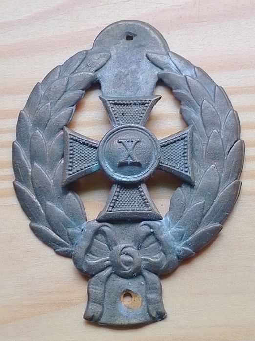 Jakaś stara odznaka 10 lat służby .