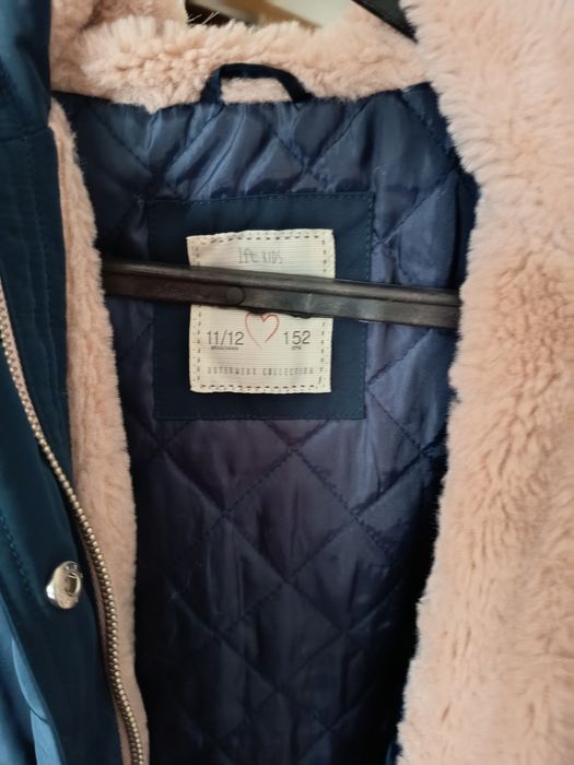 Fotos casaco impermeável com gorro pelúcia