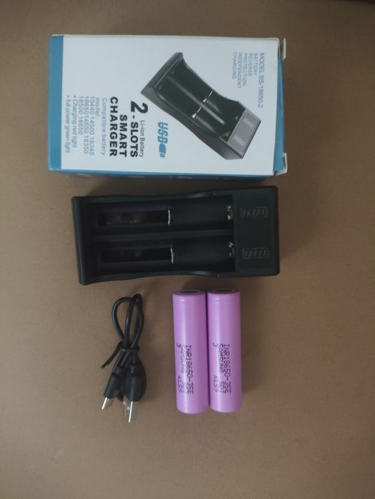 Carregador duplo + 2 Baterias Samsung 18650

Em excelente estado d