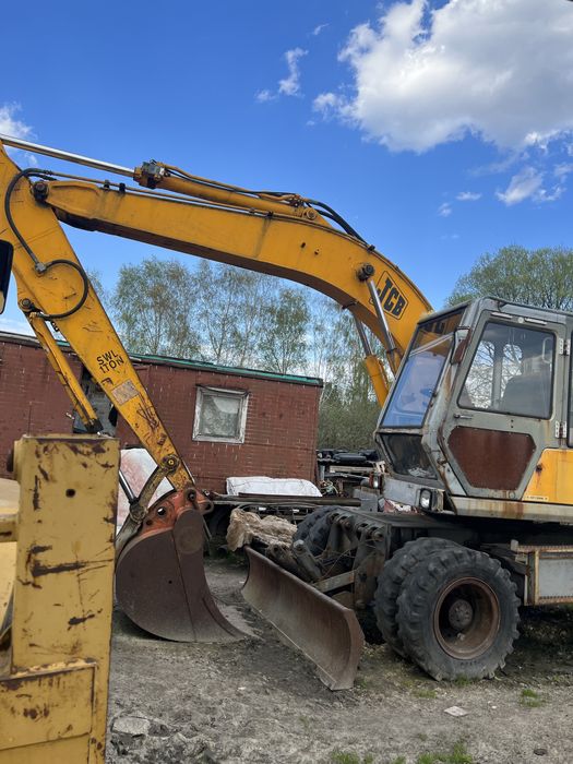 JCB єкскаватор колісний       Оборотний