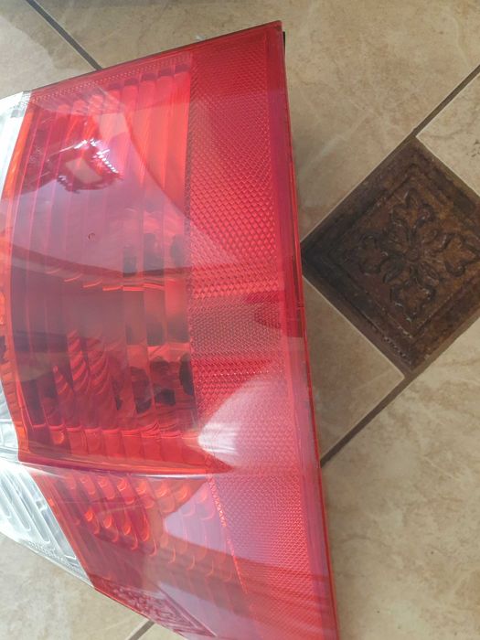 bmw e61 lampy tylne w błotniki przedlift
