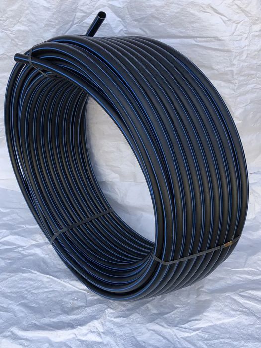 Труба ПЭТ 25 - 6 атмосфер  по 100метров.