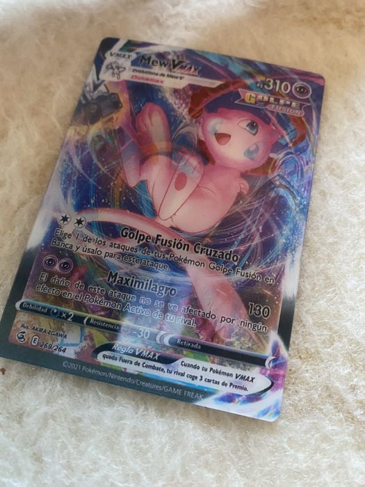 Mew Vmax (Fusion Strike) with two illusion versions.64563994908417124