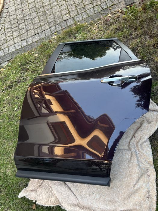 Mazda CX7 drzwi lewy tyl kollr 28w.