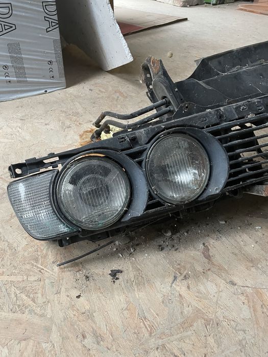 Bmw e34 komplet pas przedni Hella Shadow linie