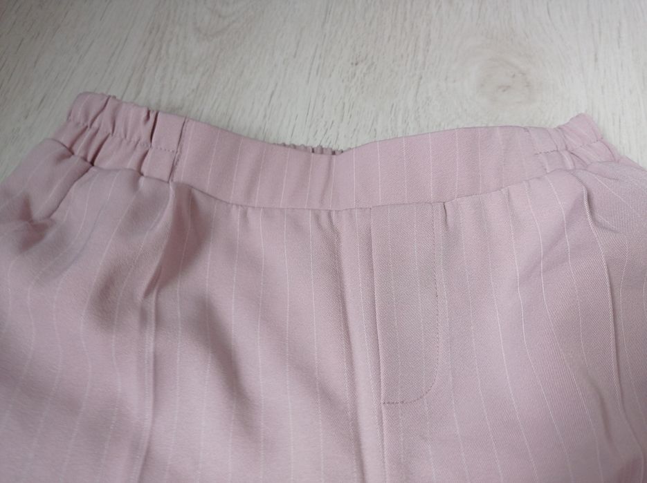 Spodnie z kantem House