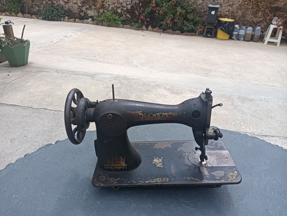 Cabeça de máquina costura