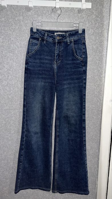 Вінтажні  джинси труби