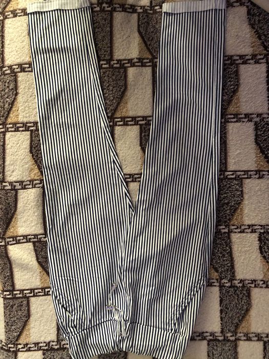 Чорно білі штани в полоску