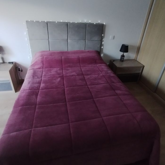 Cama com arrumação