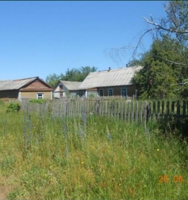 Продам будинок і земельну ділянку біля будинку