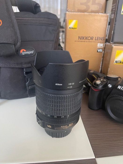Nikon AF-S DX NIKKOR 18–105mm VR — универсальный объектив, коробка и бленда