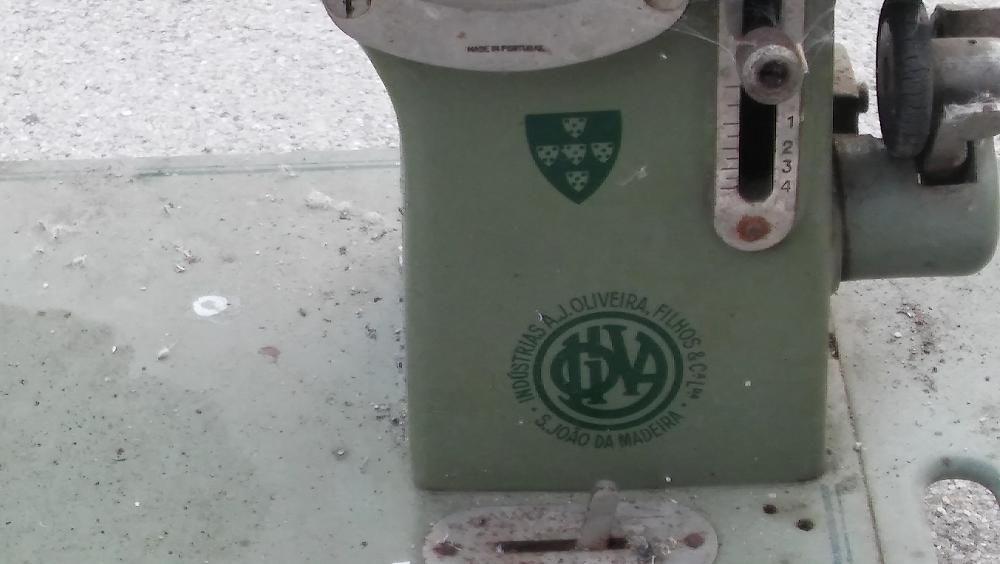 Maquina da costura da oliva