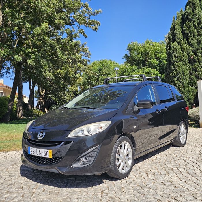 Vendo mazda 5 de 7 lugares está extremamente impecável