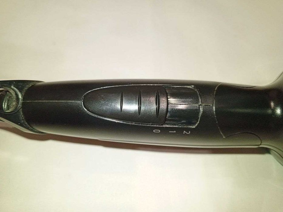 Компактний дорожній фен моделі Remington D1500