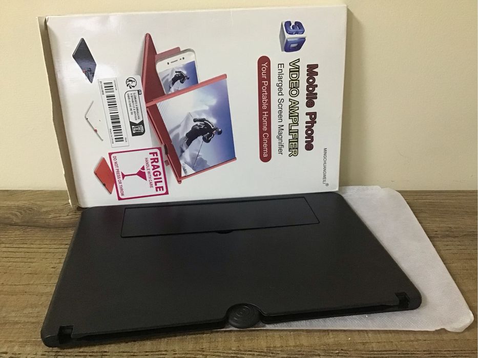 Увеличительное стекло для телефона