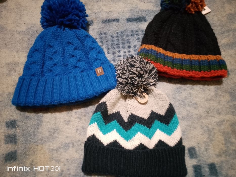 Шапки нові фірми next