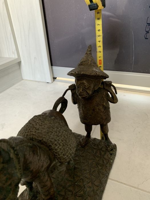 Металическая, старинная статуэтка из африки