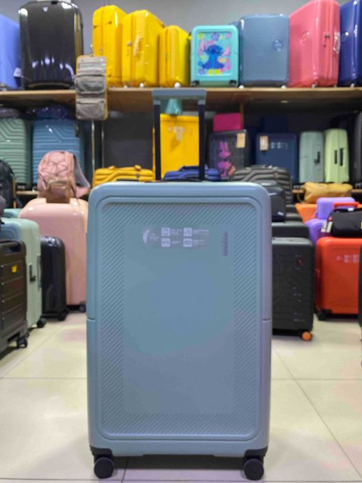 Чемодан American Tourister средний с росширеннием и плавными колёсами