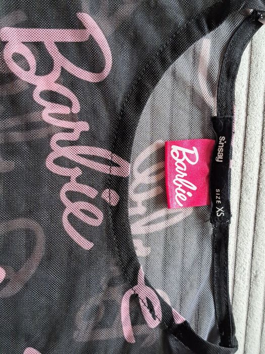 Prześwitujący top Barbie marki Sinsay