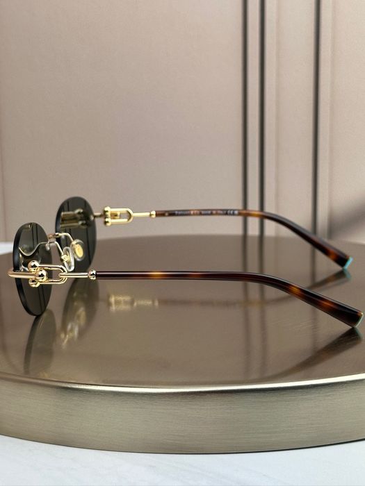 Сонцезахисні окуляри Tiffany & Co TF3104D безоправні овальні золоті жіночі оригінал