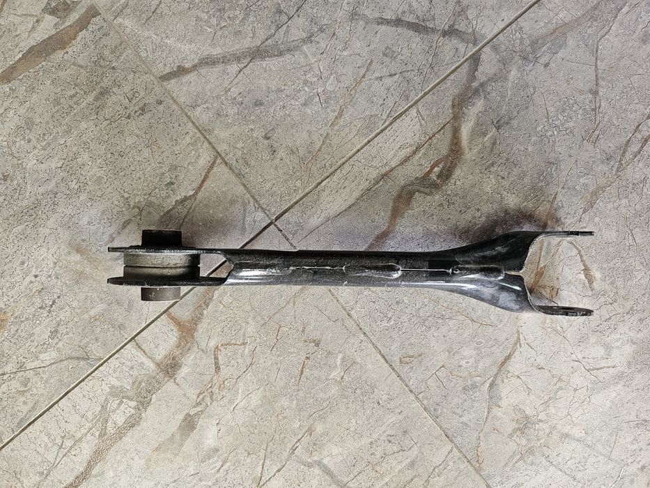 Рычаг Tesla 1044427-00-C