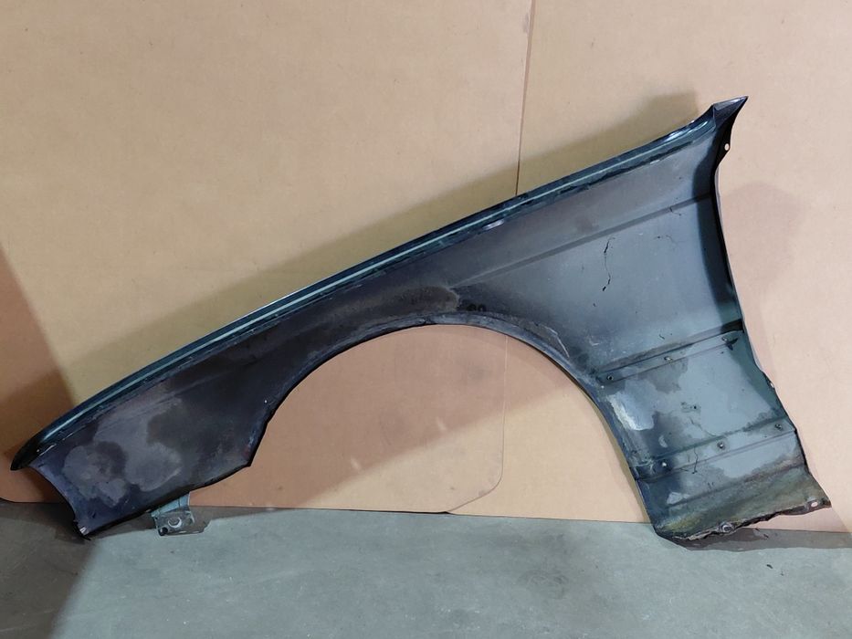 Guarda lamas direito BMW e34