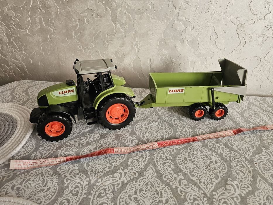 Продам іграшку трактор з причепом