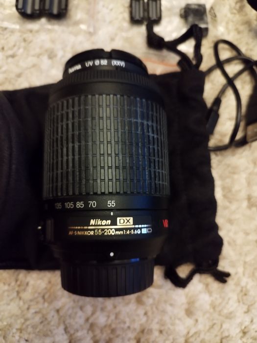 Nikon D3100 + lente extra