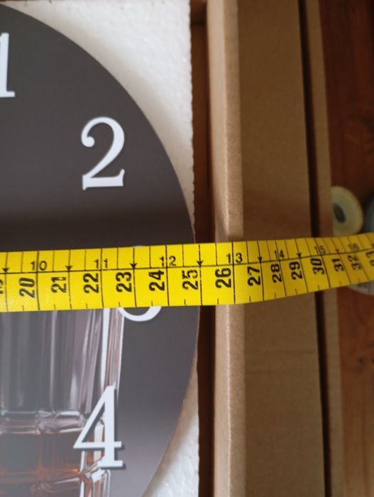 Vários relógios de parede Jack Daniels