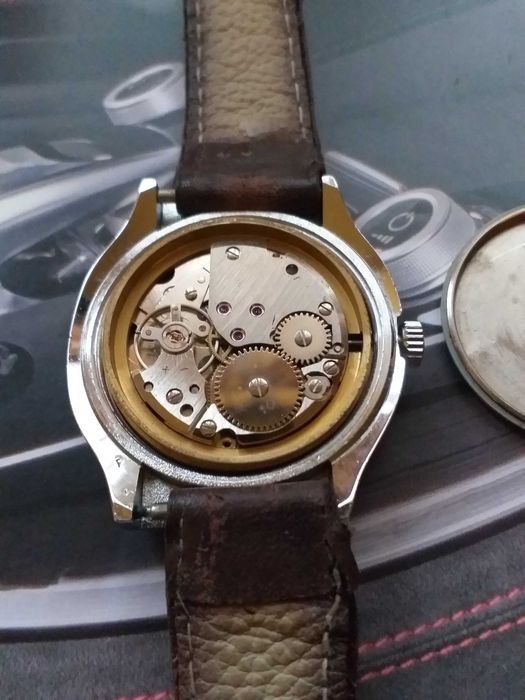 relogio cisne corda manual