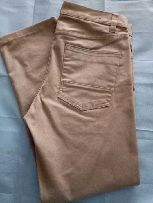 Calças Homem H&M Slim Fit cinzentas.