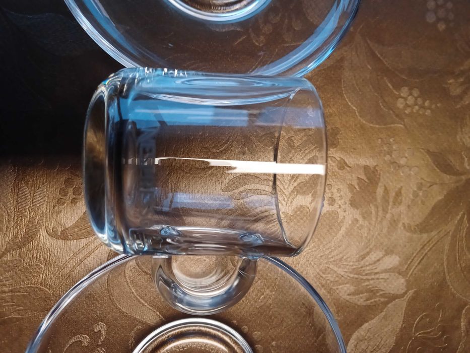 Chávenas de café e pires vários da NESPRESSO